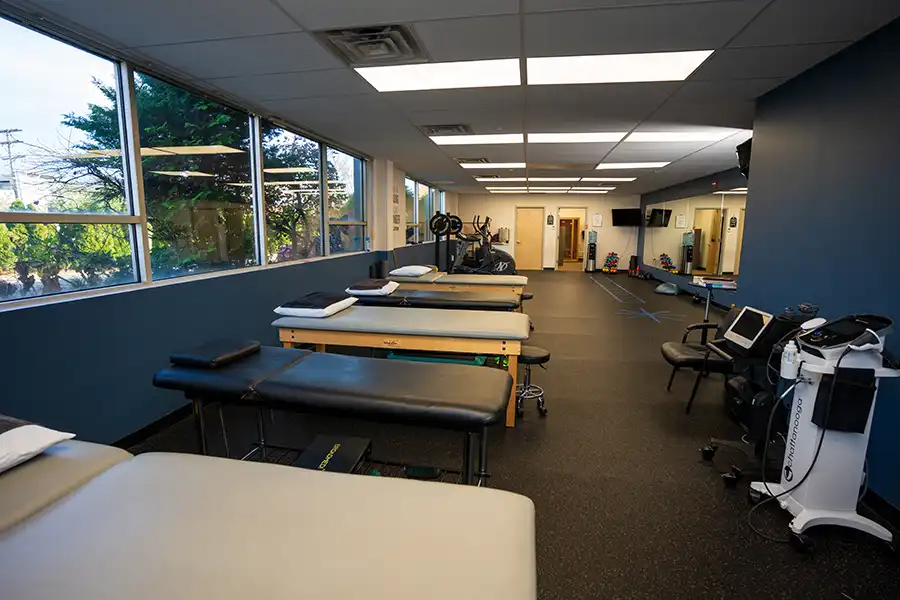 Private treatment room with therapy tables at our clinic